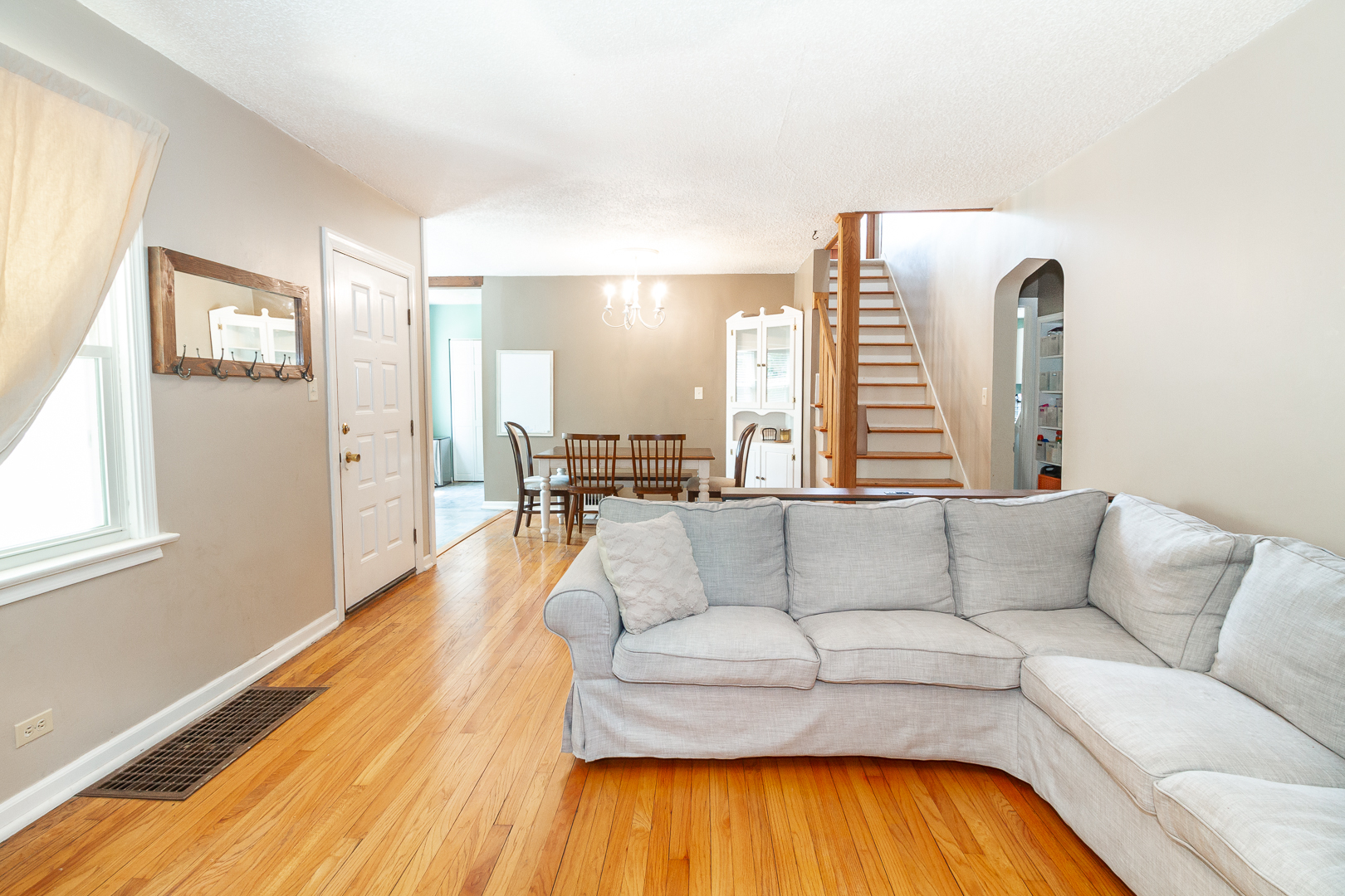 1305 Daly Road Wheaton, IL 60187 - Photo 3 of 27 a living room with furniture and wooden floor