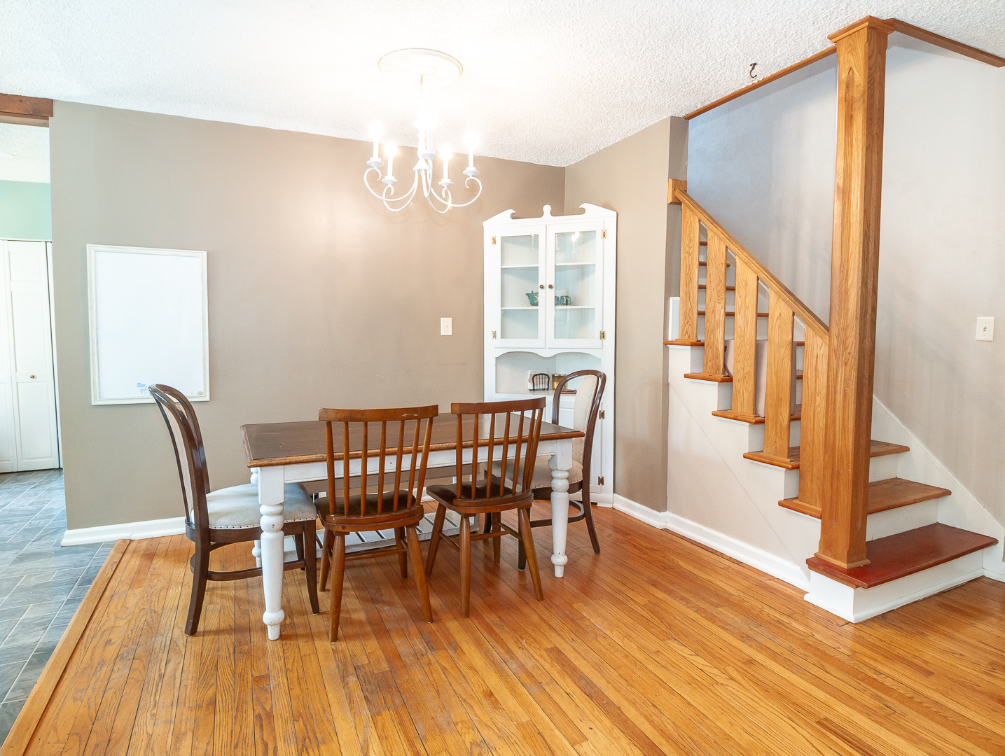1305 Daly Road Wheaton, IL 60187 - Photo 5 of 27 a view of a dining room with furniture and wooden floor