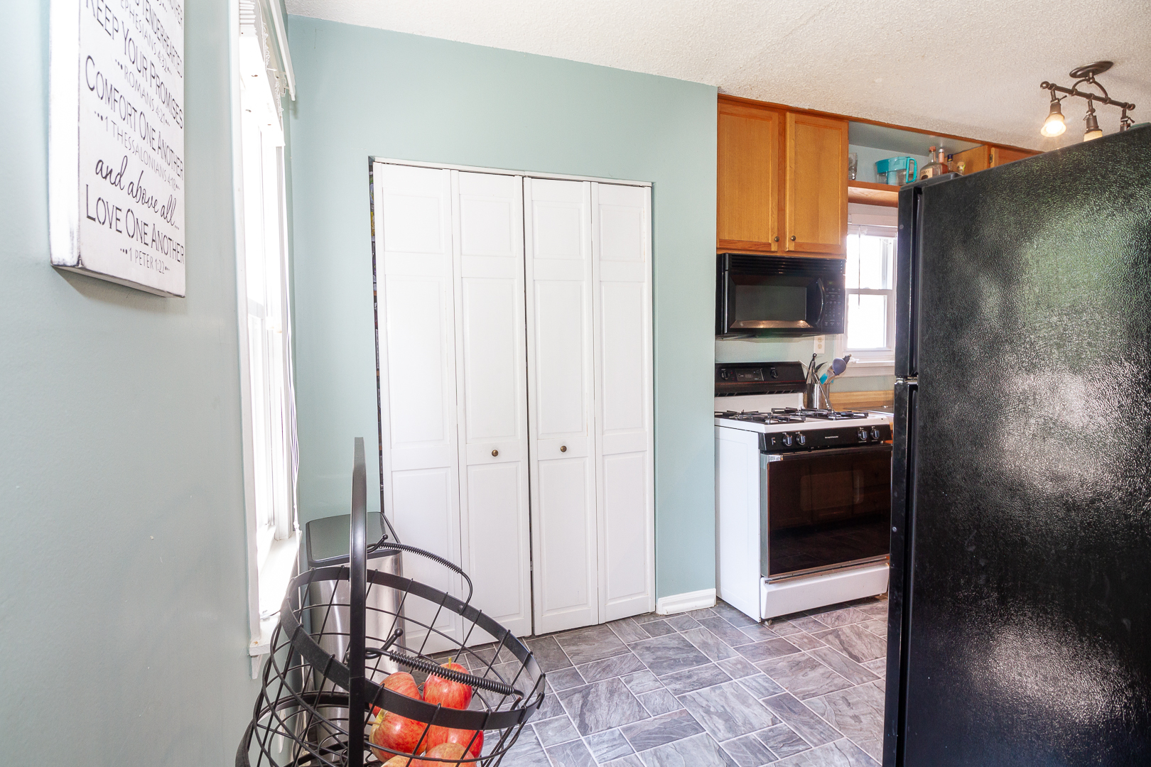 1305 Daly Road Wheaton, IL 60187 - Photo 6 of 27 a kitchen with stainless steel appliances granite countertop a refrigerator and a stove top oven