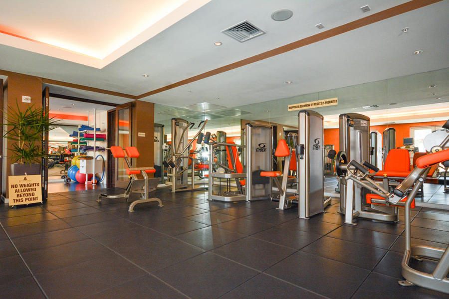 550 Okeechobee Boulevard, Unit 1721 West Palm Beach, FL 33401 - Photo 11 of 12 a view of a room with gym equipment