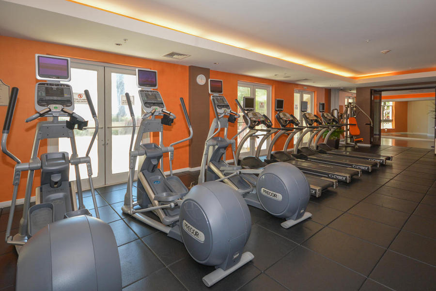 550 Okeechobee Boulevard, Unit 1721 West Palm Beach, FL 33401 - Photo 10 of 12 a view of a room with gym equipment