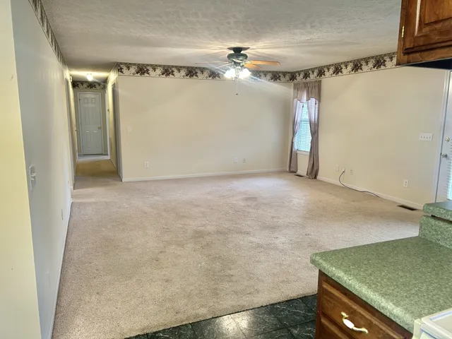 a view of a balcony with wooden floor