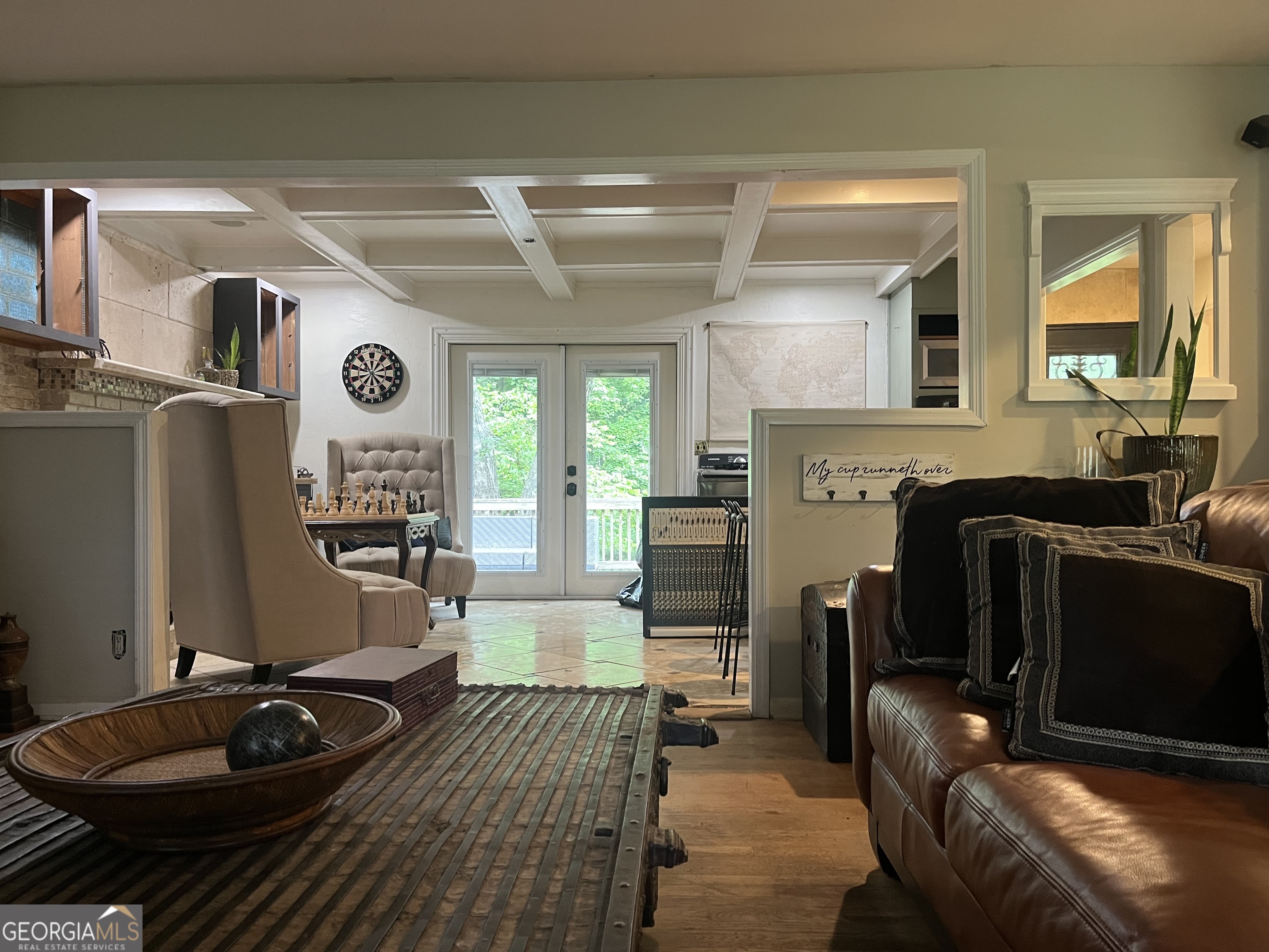 6450 East Stubbs Road South Fulton, GA 30349 - Photo 14 of 33 a living room with furniture and a fireplace