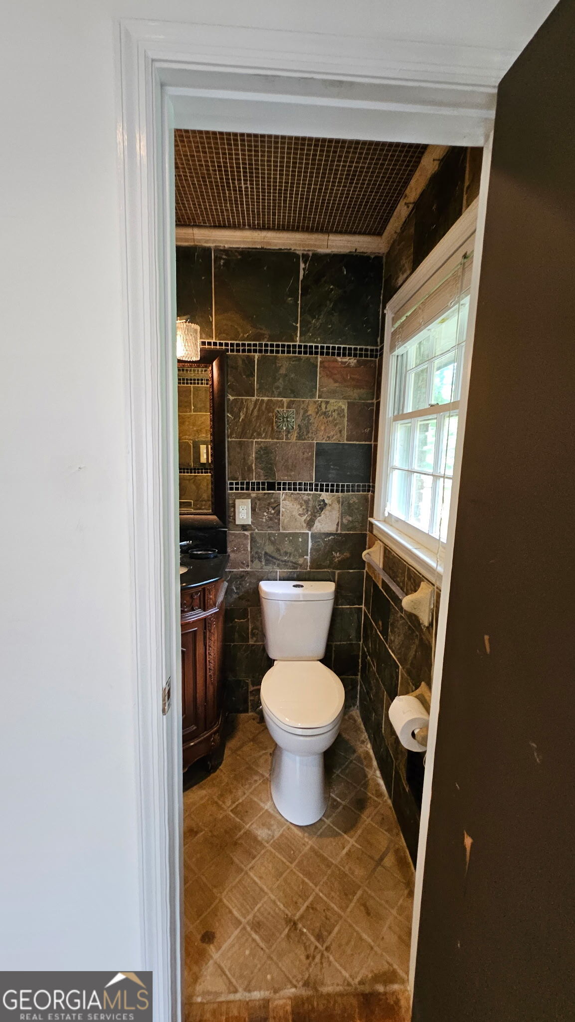 6450 East Stubbs Road South Fulton, GA 30349 - Photo 27 of 33 a bathroom with a toilet