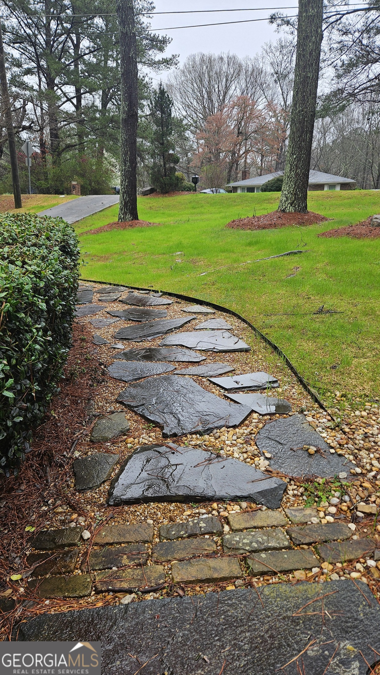 6450 East Stubbs Road South Fulton, GA 30349 - Photo 3 of 33 a view of a park with large trees