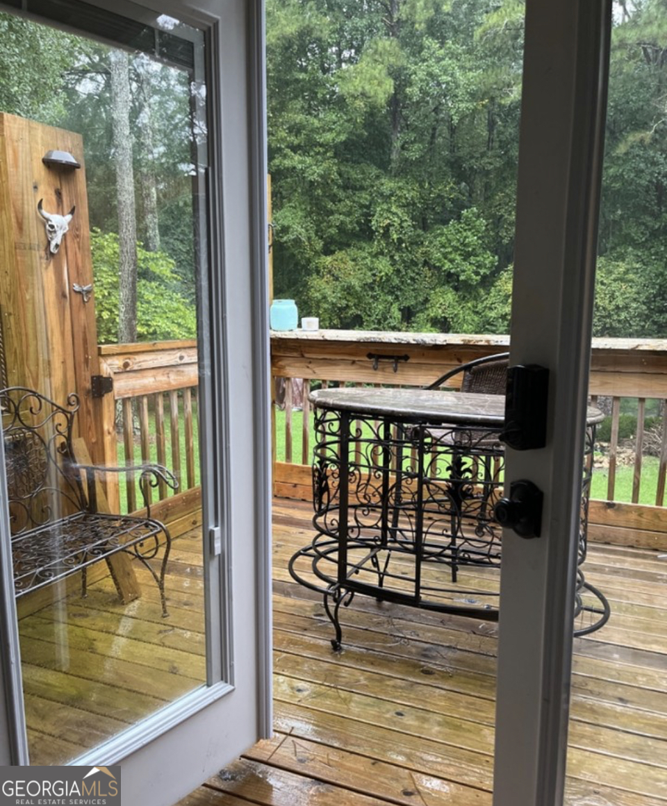 6450 East Stubbs Road South Fulton, GA 30349 - Photo 31 of 33 a view of swimming pool from a balcony