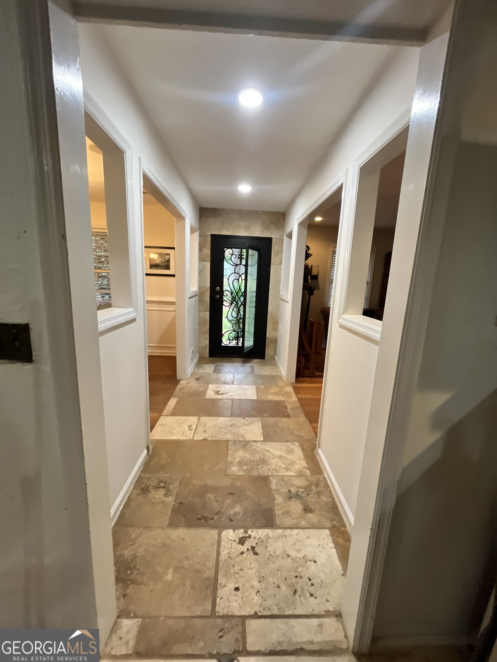 6450 East Stubbs Road South Fulton, GA 30349 - Photo 7 of 33 a view of entryway with a window and a yard