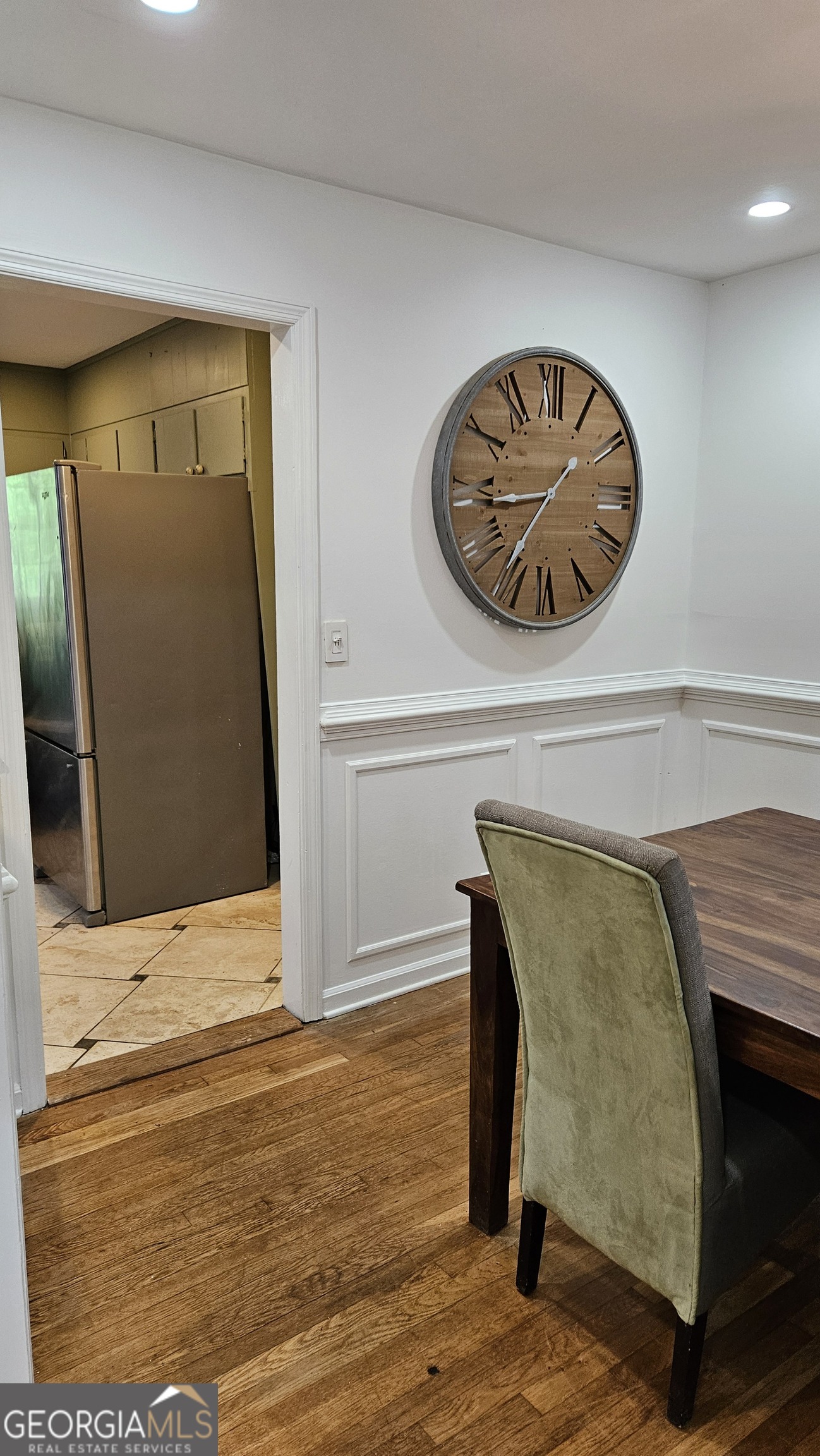 6450 East Stubbs Road South Fulton, GA 30349 - Photo 10 of 33 a bedroom with a bed and painting on the wall