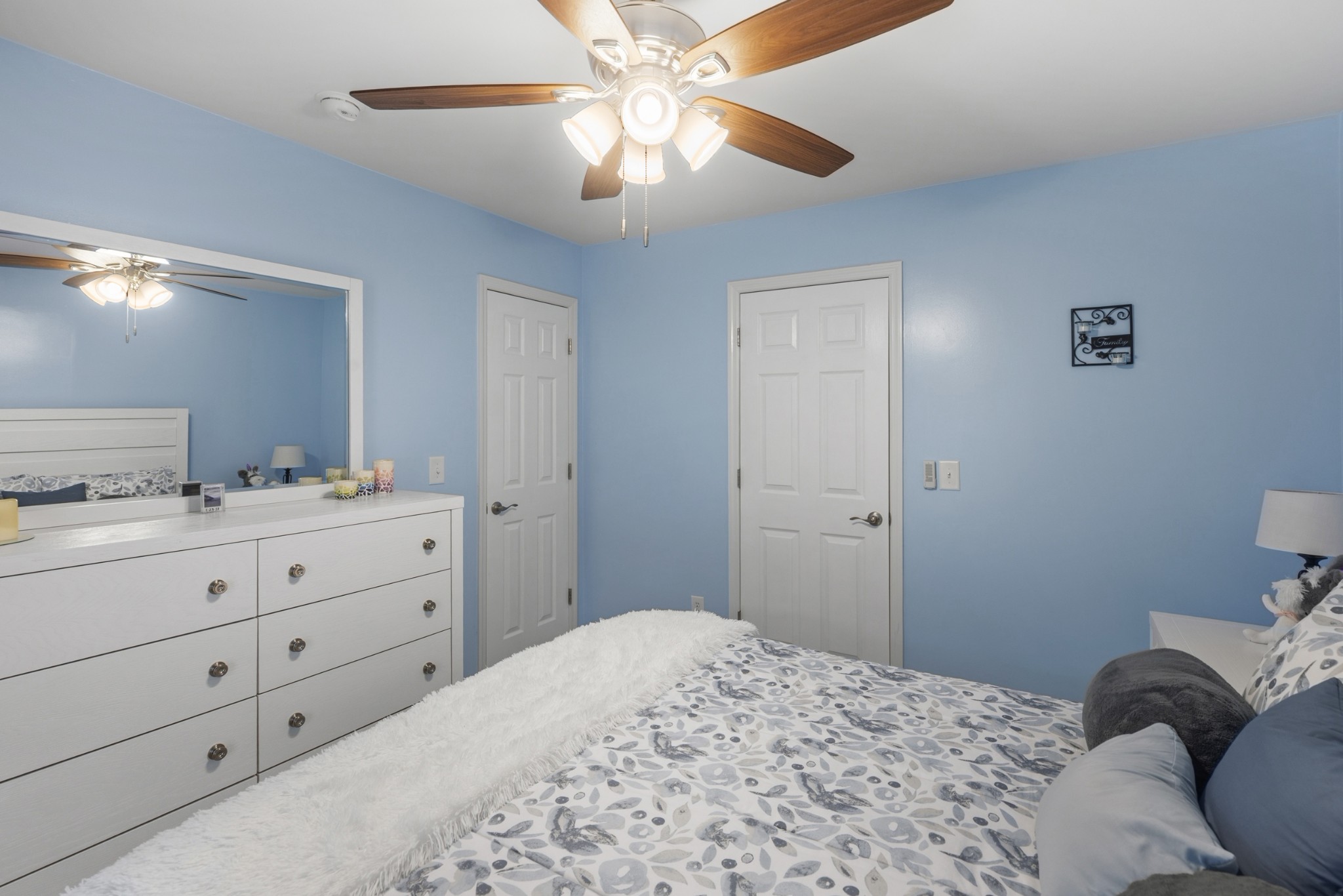454 Campbell Hollow Road Bethpage, TN 37022 - Photo 42 of 57 a bedroom with a bed and a mirror on dresser