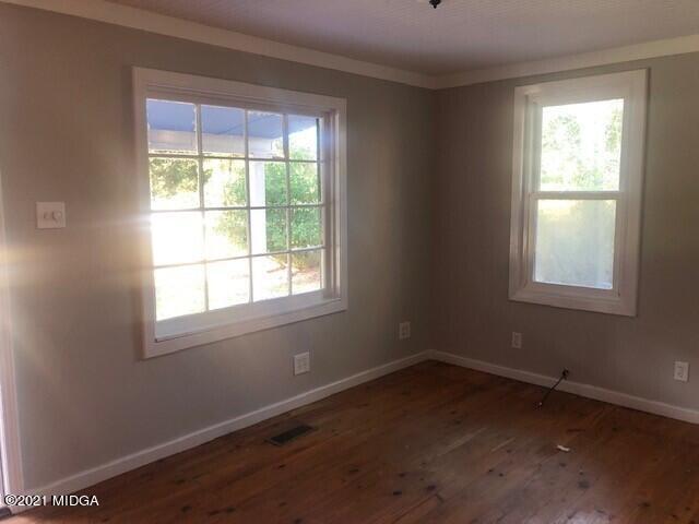 5310 Dixon Road Lizella, GA 31052 - Photo 9 of 18 an empty room with a window