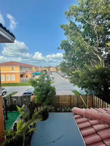 a view of a patio in backyard