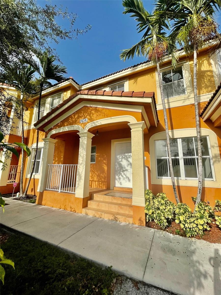 24343 Southwest 109th Avenue Homestead, FL 33032 - Photo 4 of 26 a front view of a house