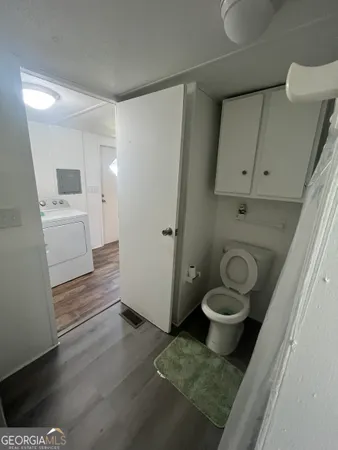 a bathroom with a sink and a toilet