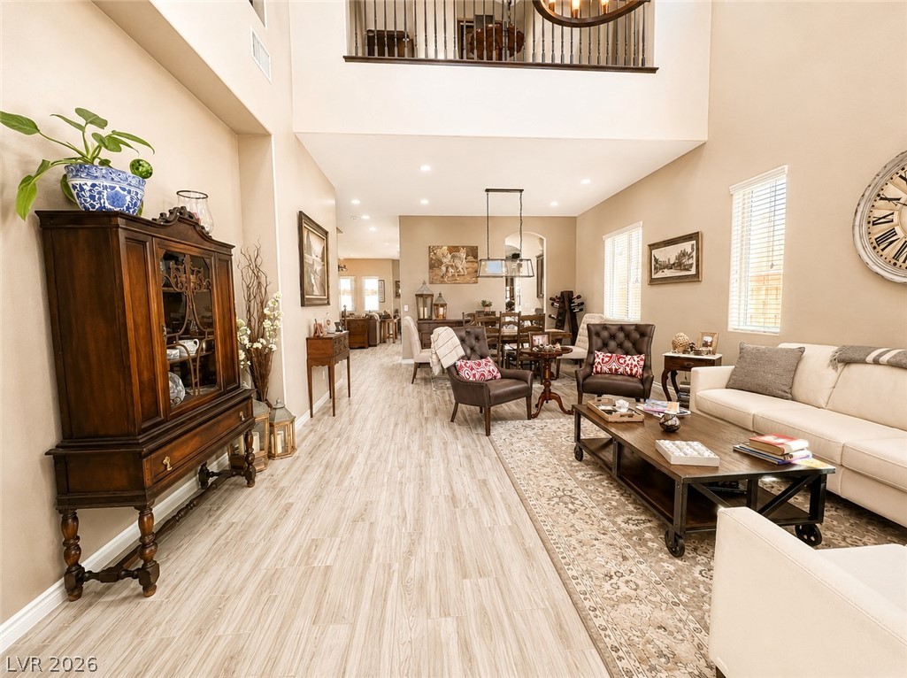 9724 University Ridge Avenue Las Vegas, NV 89149 - Photo 60 of 61 The soaring vaulted ceilings and expansive open floorplan create an airy living space perfect for entertaining.