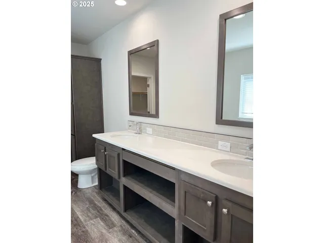 a bathroom with a sink and a toilet