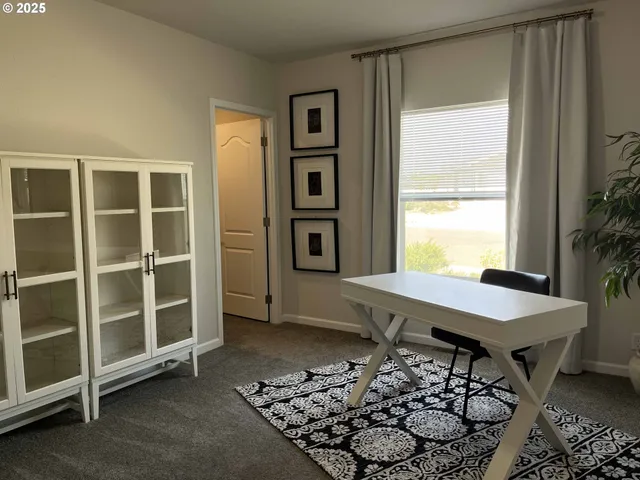 a room with furniture and window