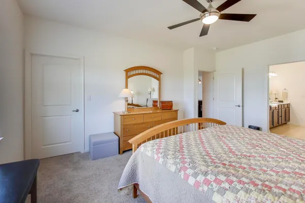 a bedroom with a bed and a closet