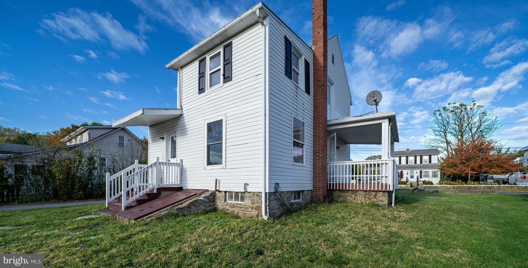 25329 Highfield Road Cascade, MD 21719 - Photo 11 of 51 a front view of a house with garden