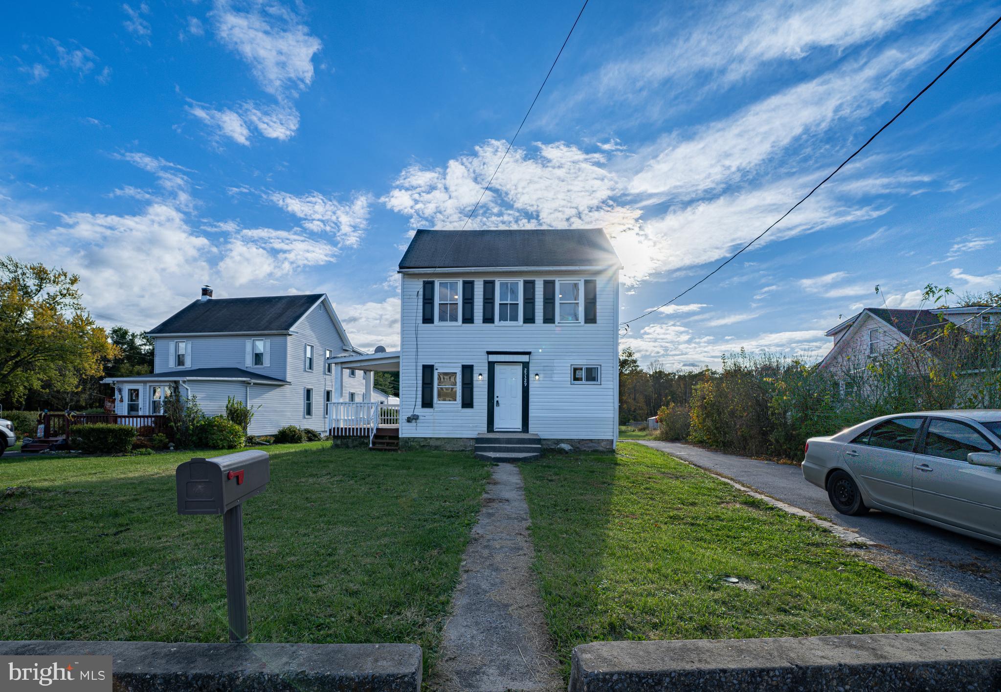 25329 Highfield Road Cascade, MD 21719 - Photo 14 of 51 a front view of a house with garden