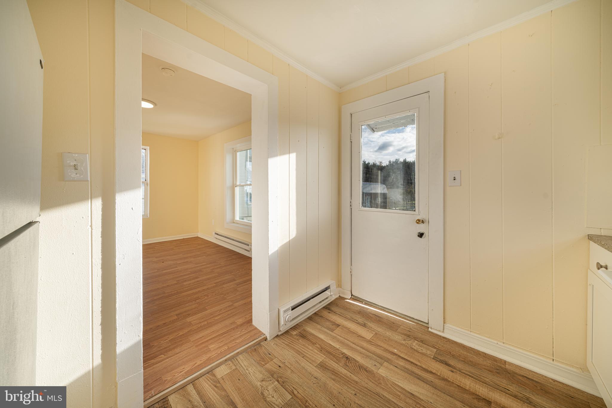 25329 Highfield Road Cascade, MD 21719 - Photo 30 of 51 a view of a hallway with wooden floor