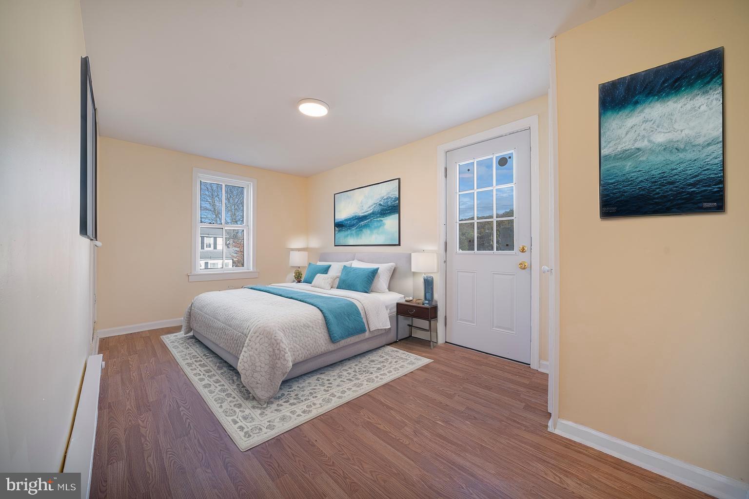 25329 Highfield Road Cascade, MD 21719 - Photo 33 of 51 a bedroom with a bed and a flat screen tv