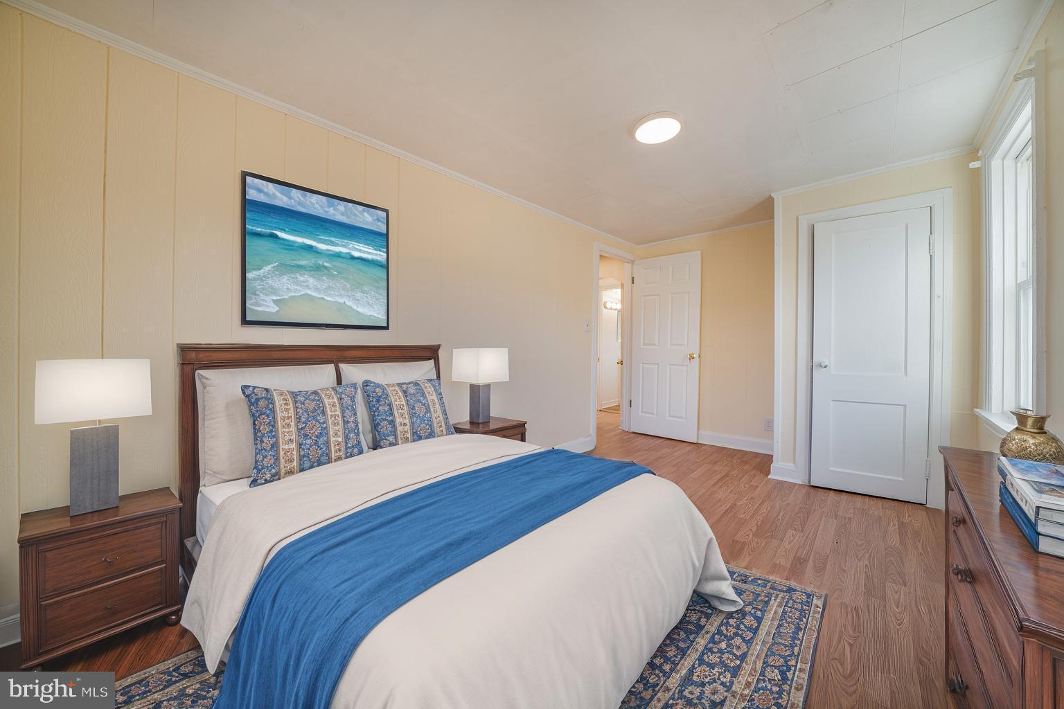 25329 Highfield Road Cascade, MD 21719 - Photo 41 of 51 a bedroom with a bed and a painting on the wall