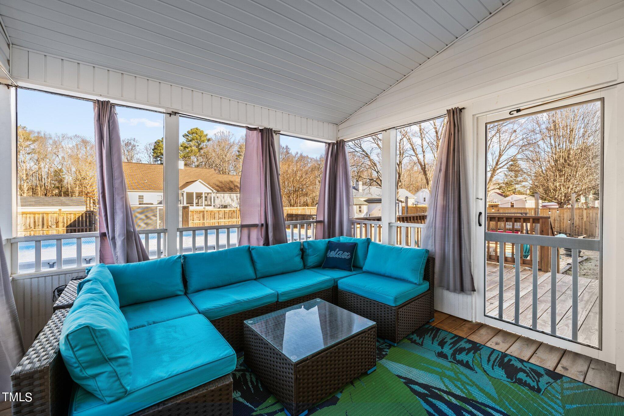 1516 Harvey Johnson Road Raleigh, NC 27603 - Photo 26 of 41 a living room with furniture and a large window
