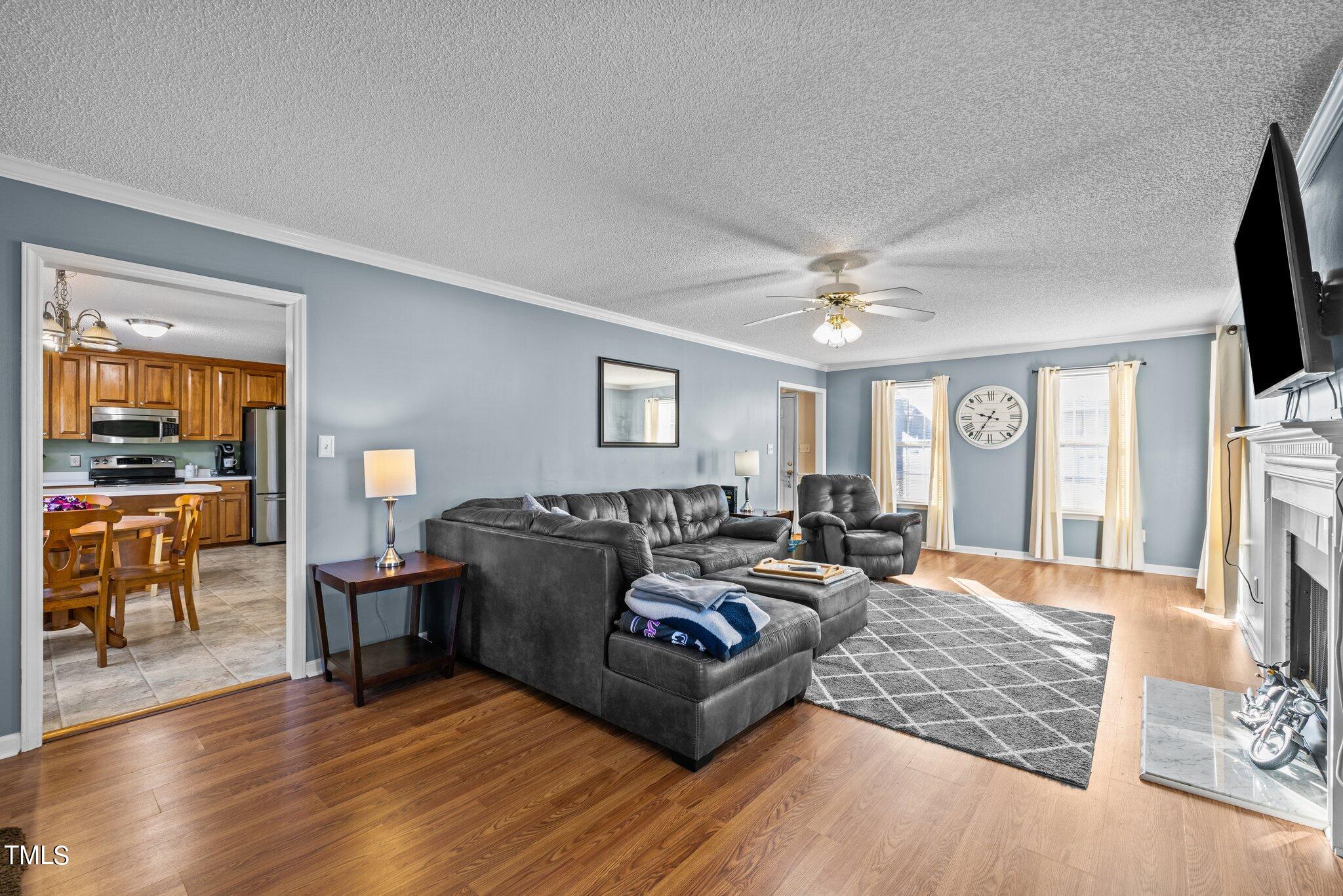 1516 Harvey Johnson Road Raleigh, NC 27603 - Photo 6 of 41 a living room with furniture and a window