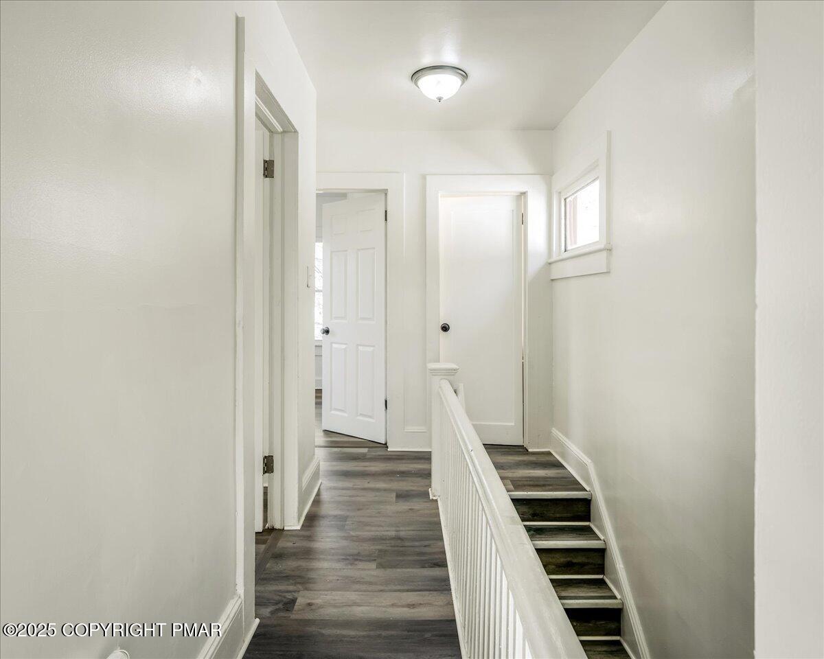 1057 Euclid Avenue Scranton, PA 18504 - Photo 11 of 23 a view of a hallway with wooden floor and entryway