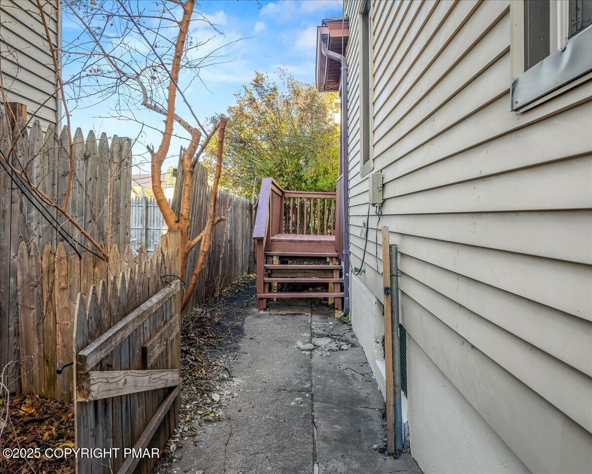 1057 Euclid Avenue Scranton, PA 18504 - Photo 21 of 23 a view of a house with backyard and wooden fence