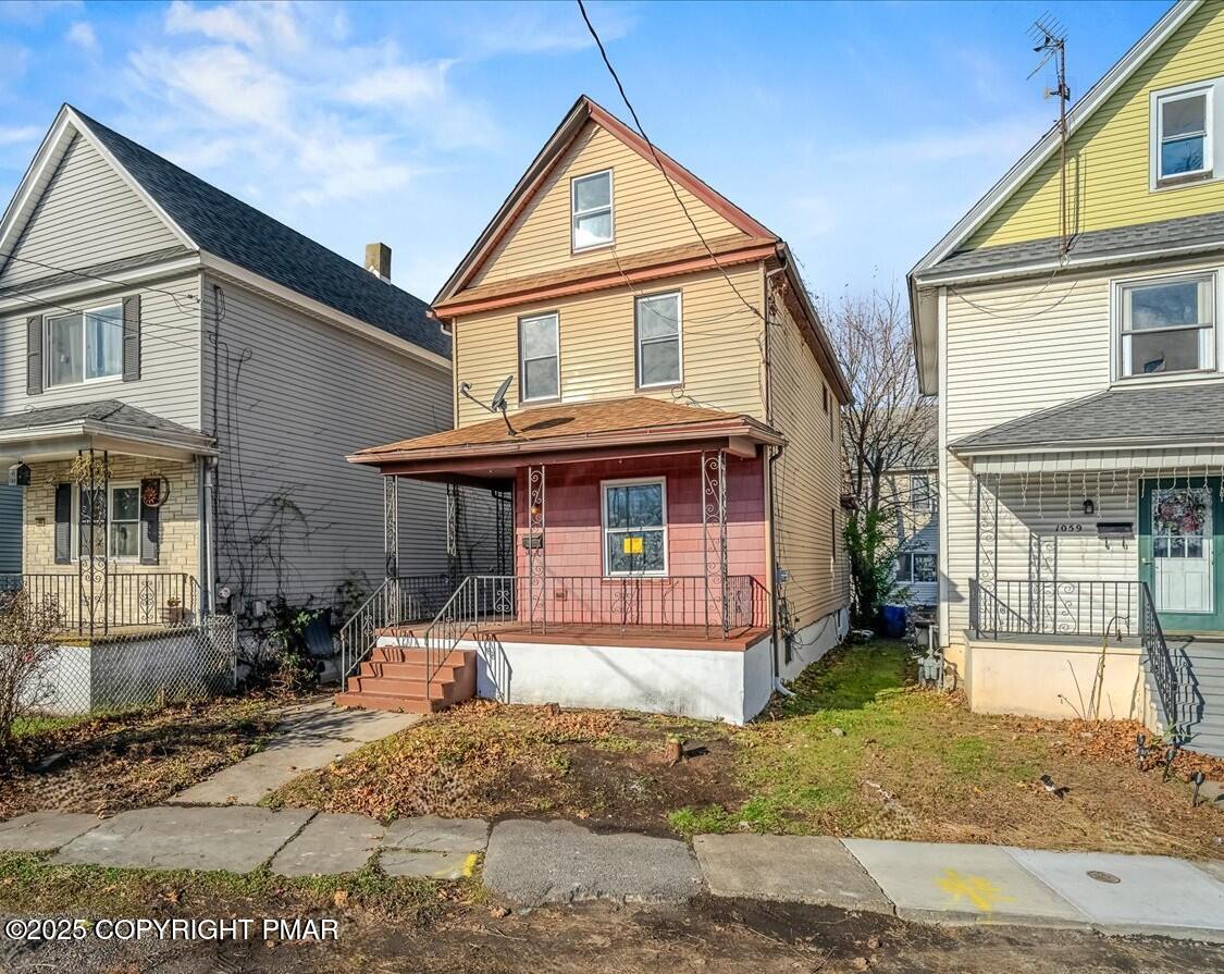 1057 Euclid Avenue Scranton, PA 18504 - Photo 23 of 23 a front view of a house with a porch