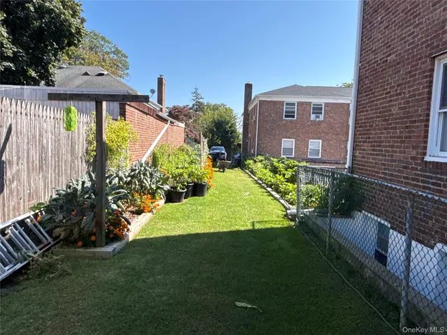 a view of a backyard with plants