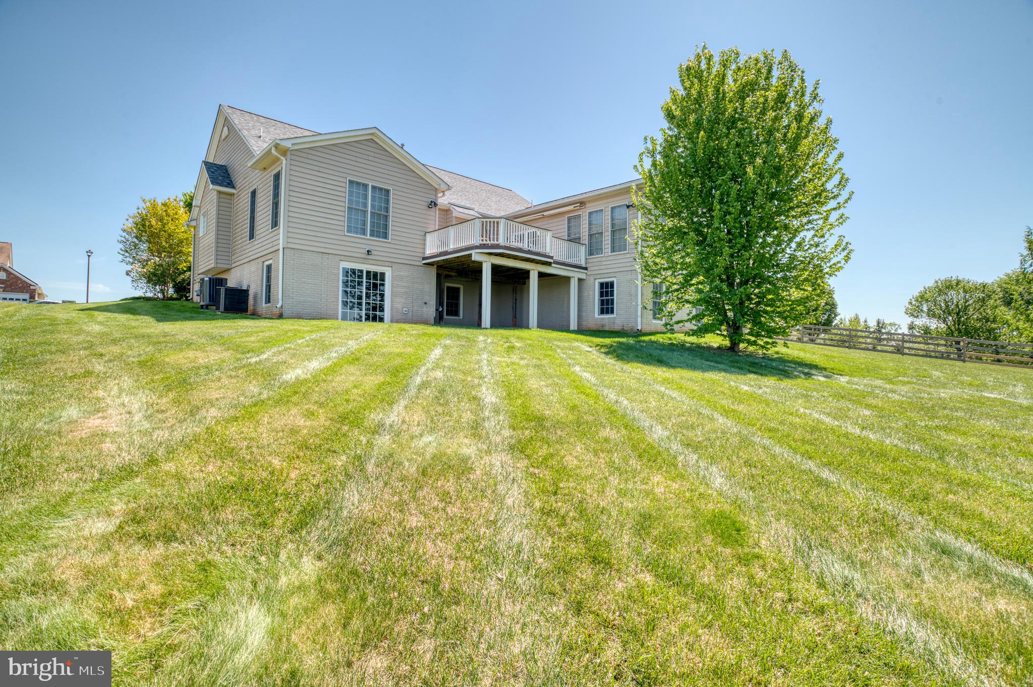 14308 South Hall Court Culpeper, VA 22701 - Photo 60 of 78 a front view of house with yard and trees in the background