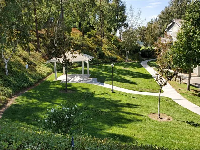a view of a park with swings