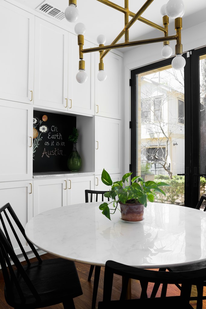 3812 Duval Street Austin, TX 78751 - Photo 14 of 22 a view of table and chair with the potted plant