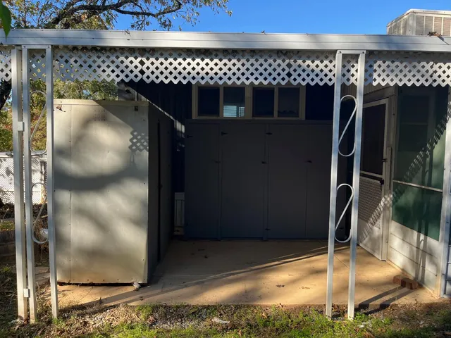 a kitchen with a glass door