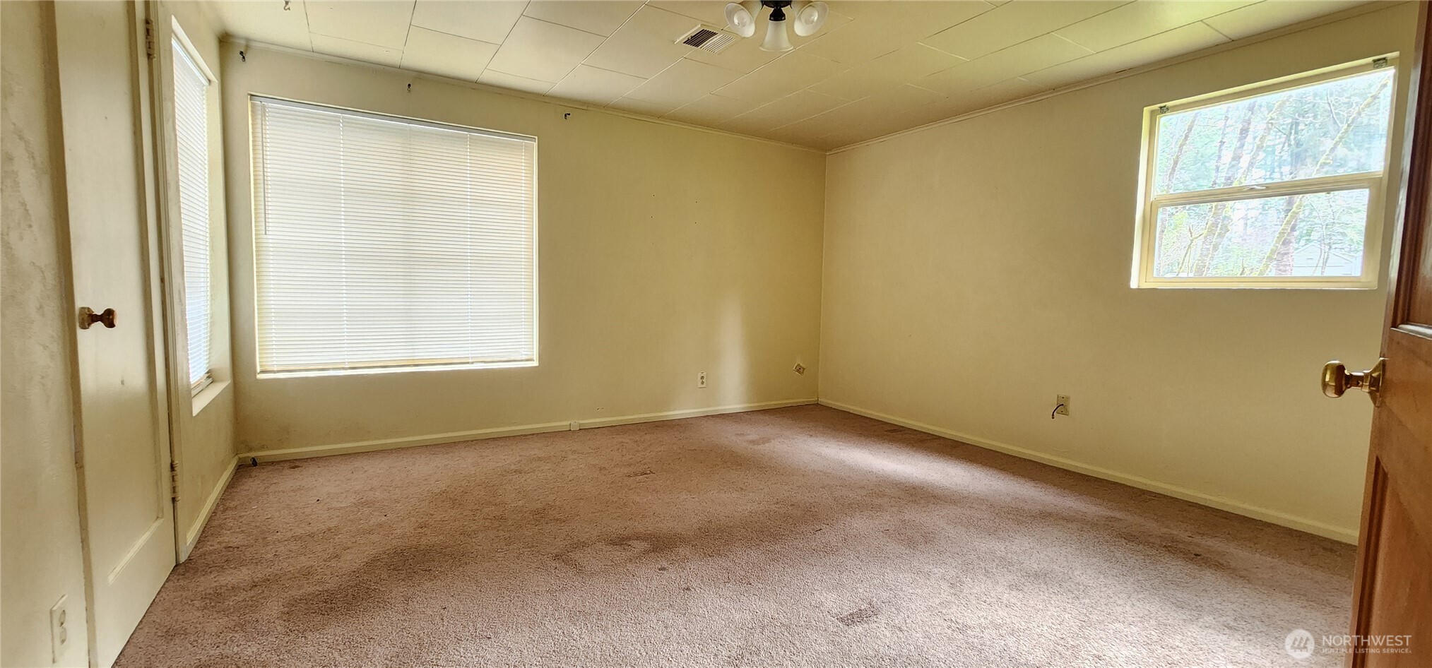 3225 Cooper Point Road Northwest Olympia, WA 98502 - Photo 29 of 40 a view of an empty room with a window