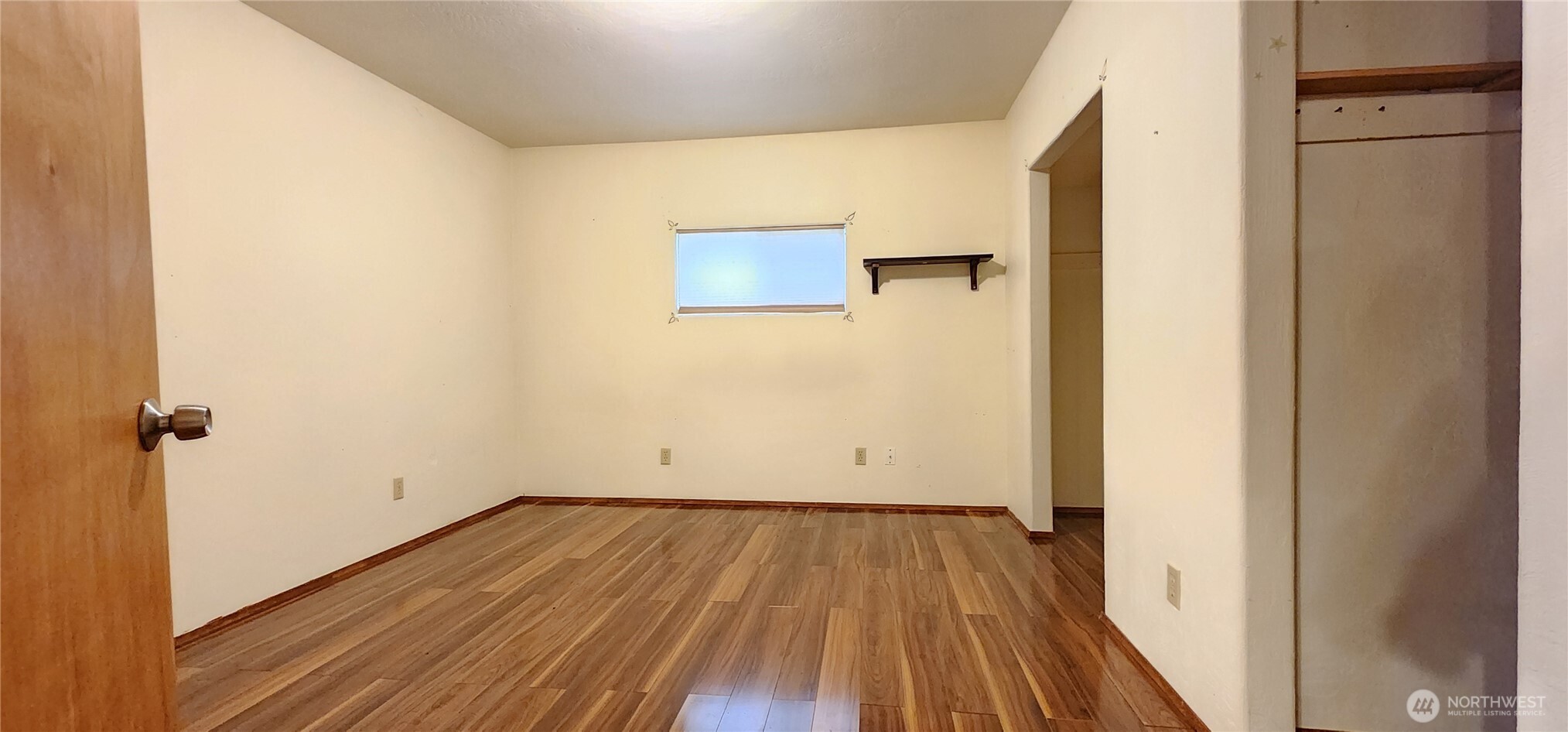 3225 Cooper Point Road Northwest Olympia, WA 98502 - Photo 34 of 40 a view of a room with wooden floor