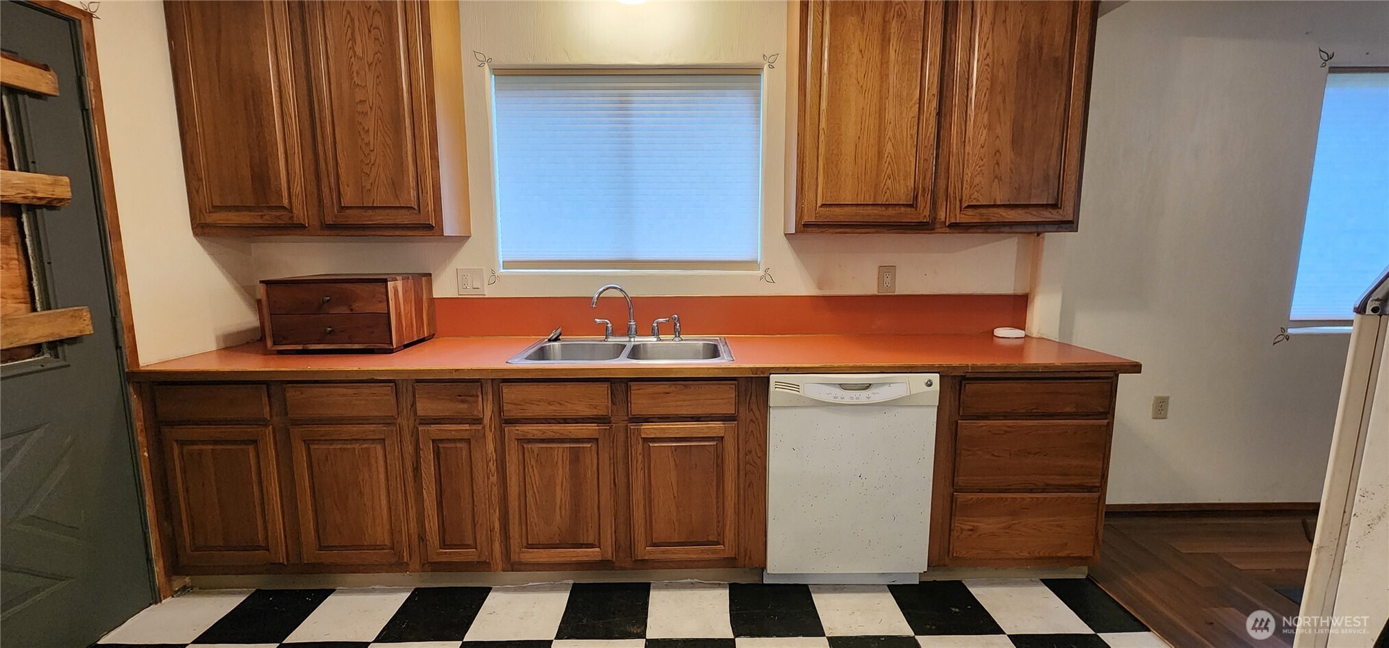 3225 Cooper Point Road Northwest Olympia, WA 98502 - Photo 37 of 40 a kitchen with stainless steel appliances a stove a microwave and a cabinets