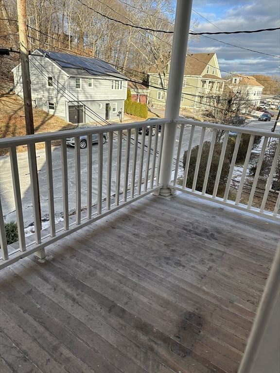 9 Station Road, Unit 2 Salem, MA 01970 - Photo 4 of 21 a view of porch with wooden floor