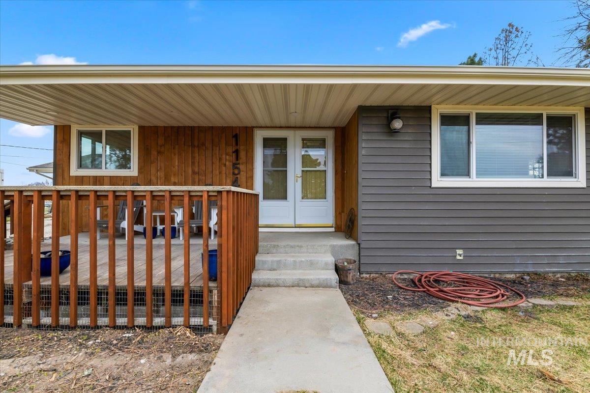 11545 Kuna Road Kuna, ID 83634 - Photo 4 of 50 View of exterior entry with a porch and french doors