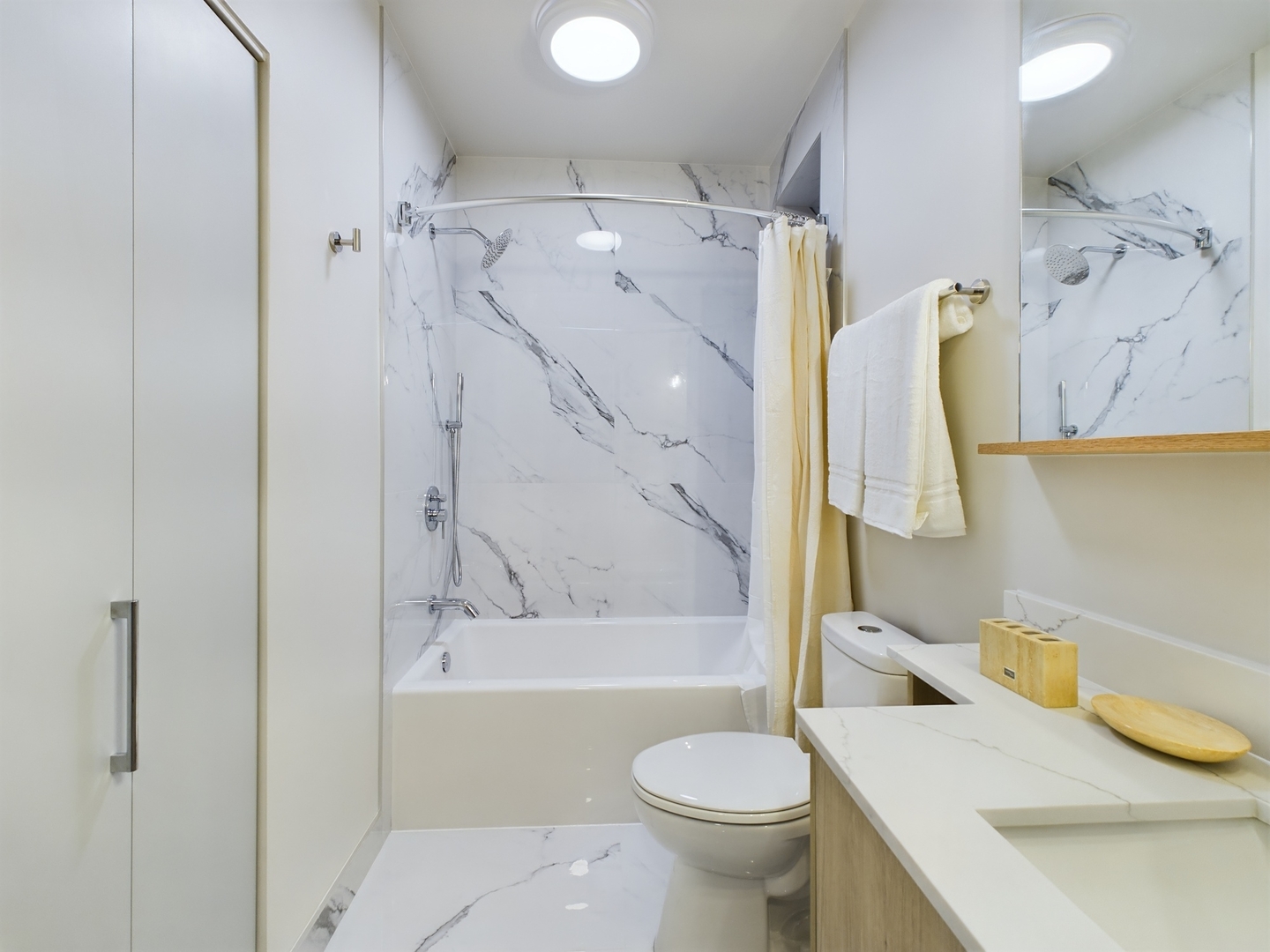 2437 West Walton Street, Unit 2F Chicago, IL 60622 - Photo 12 of 21 a bathroom with a sink toilet and shower