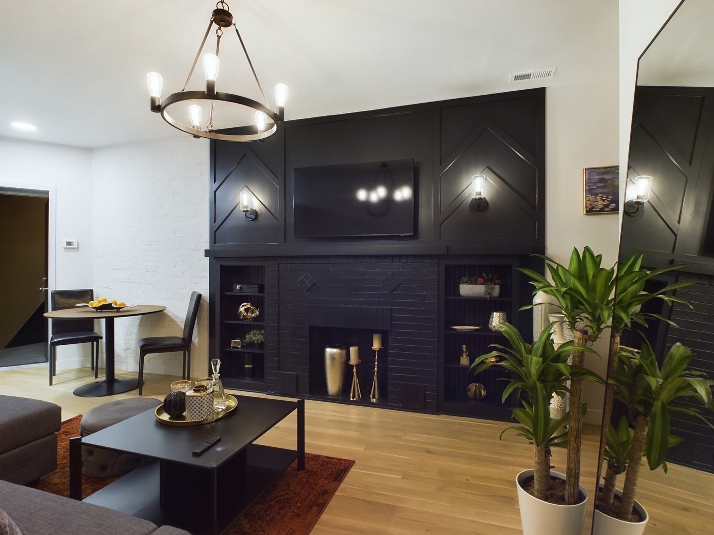 2437 West Walton Street, Unit 2F Chicago, IL 60622 - Photo 6 of 21 a living room with furniture and a fireplace