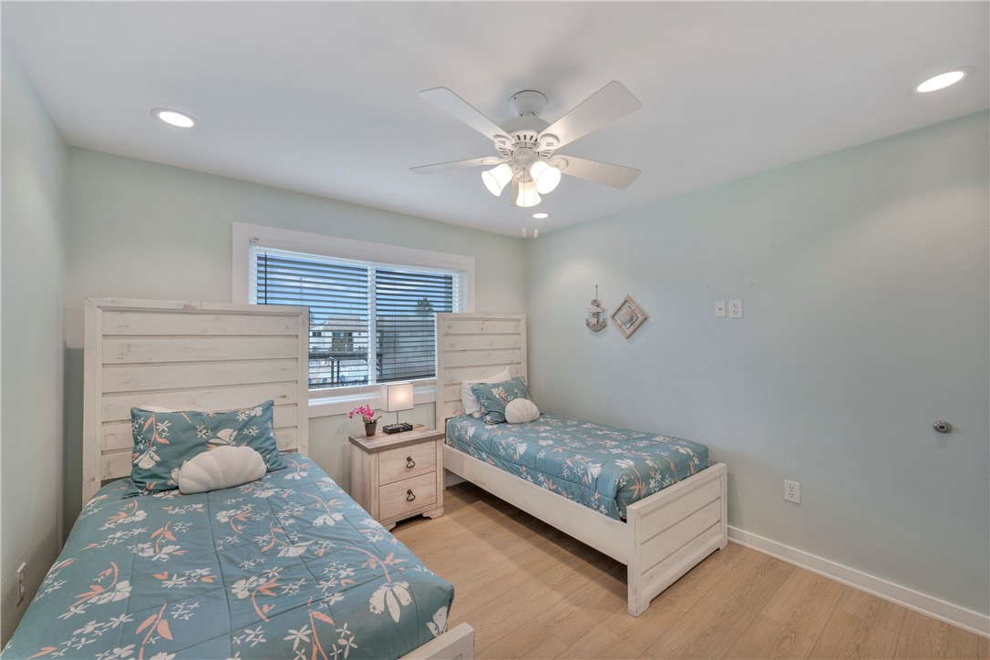 230 Cut-Off Road, Unit 205 Port Aransas, TX 78373 - Photo 16 of 37 a living room with furniture and a table