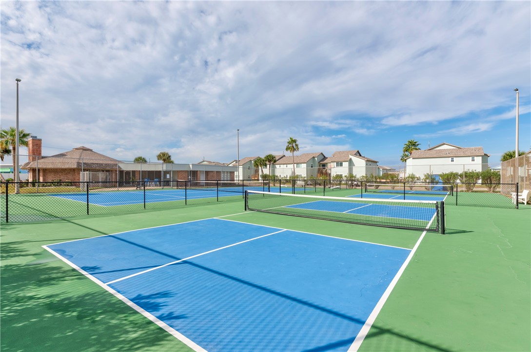 230 Cut-Off Road, Unit 205 Port Aransas, TX 78373 - Photo 36 of 37 a view of an outdoor space and tennis court