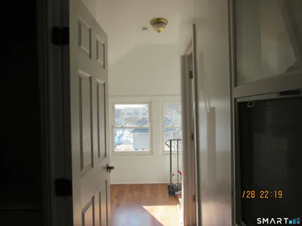 a front view of a house with parking space