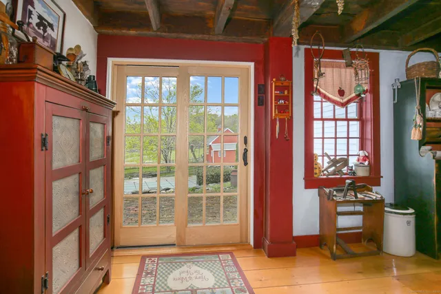 a living room with furniture and a table