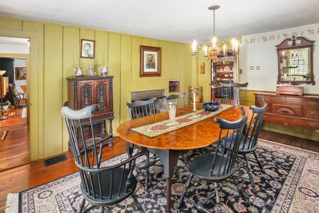 a view of a chairs and table in a patio