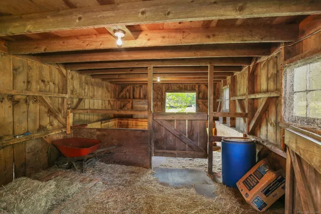 a view of a patio with a table and chairs
