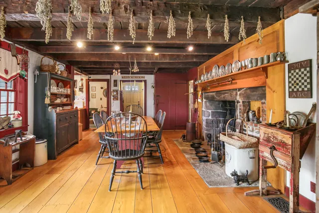 a outdoor space with lots of wooden furniture